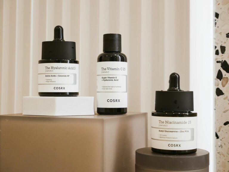 Elegant display of COSRX skincare bottles on a modern backdrop. Perfect for beauty and wellness content.